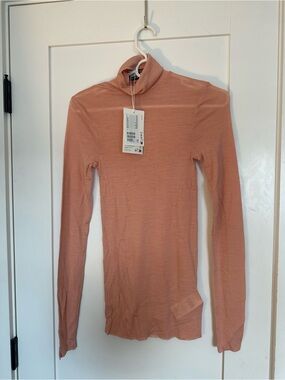 Long Sleeve 100% Wool Turtleneck Top in Dusty Peach